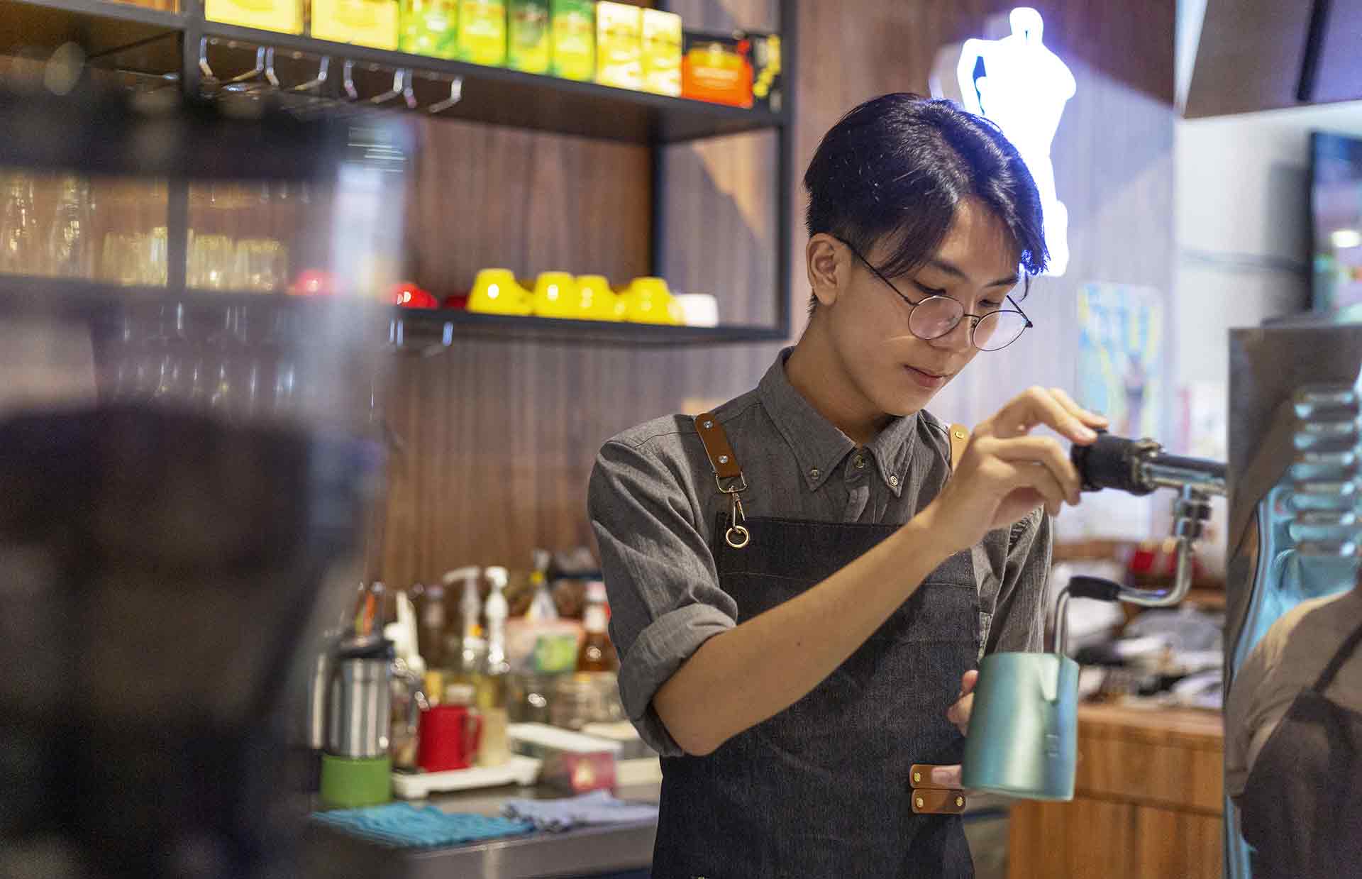 Barista making coffee