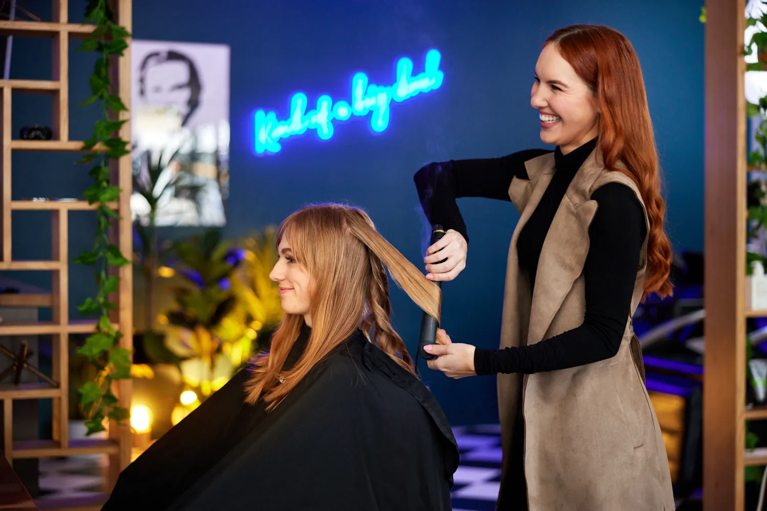 A hair stylist styling a client’s hair in a hair salon